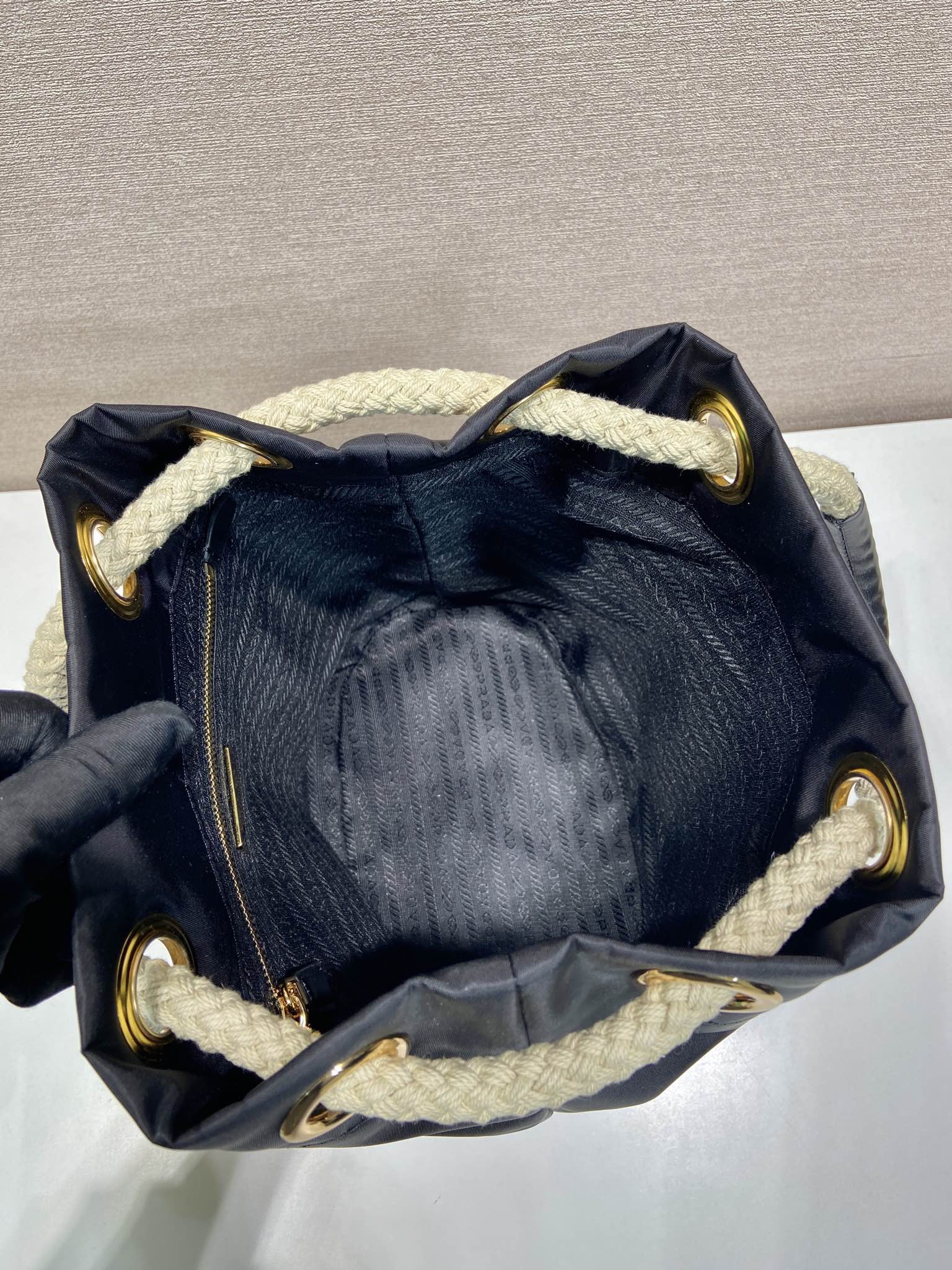 BUCKET BAG 28 IN BLACK RE-NYLON GOLD LOGO