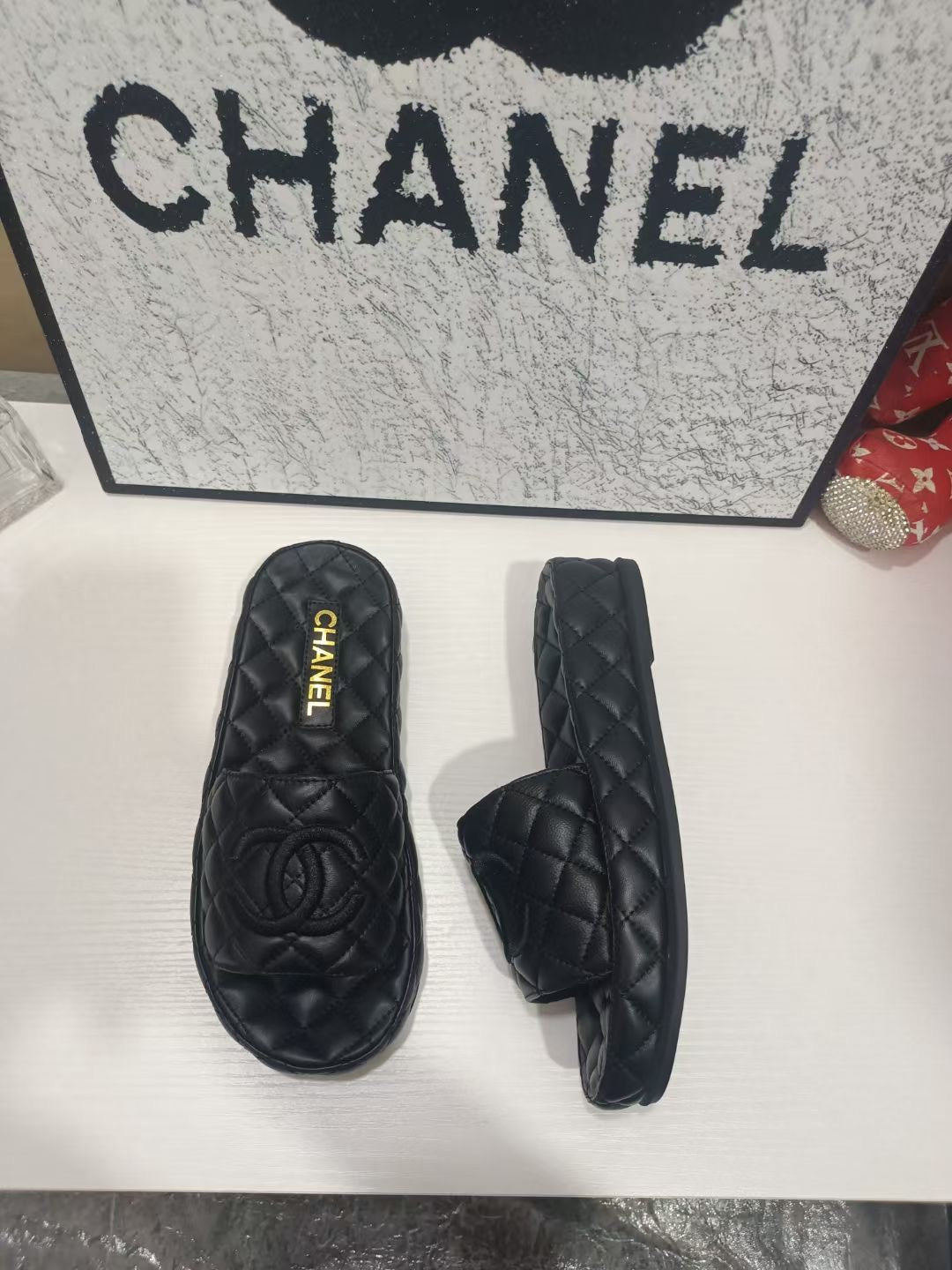 CC 26s Quilted Slide Sandals In Black Calfskin