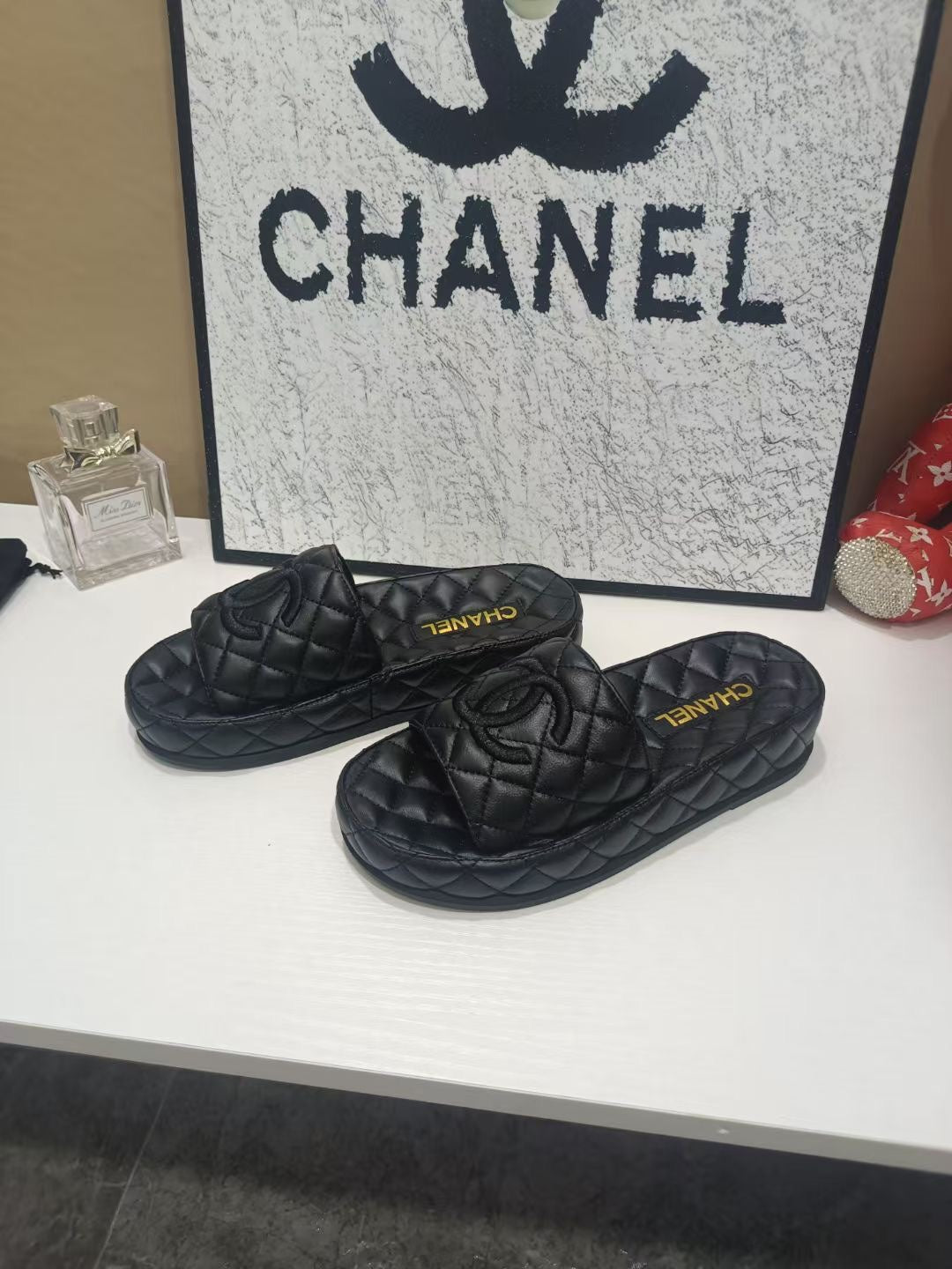 CC 26s Quilted Slide Sandals In Black Calfskin