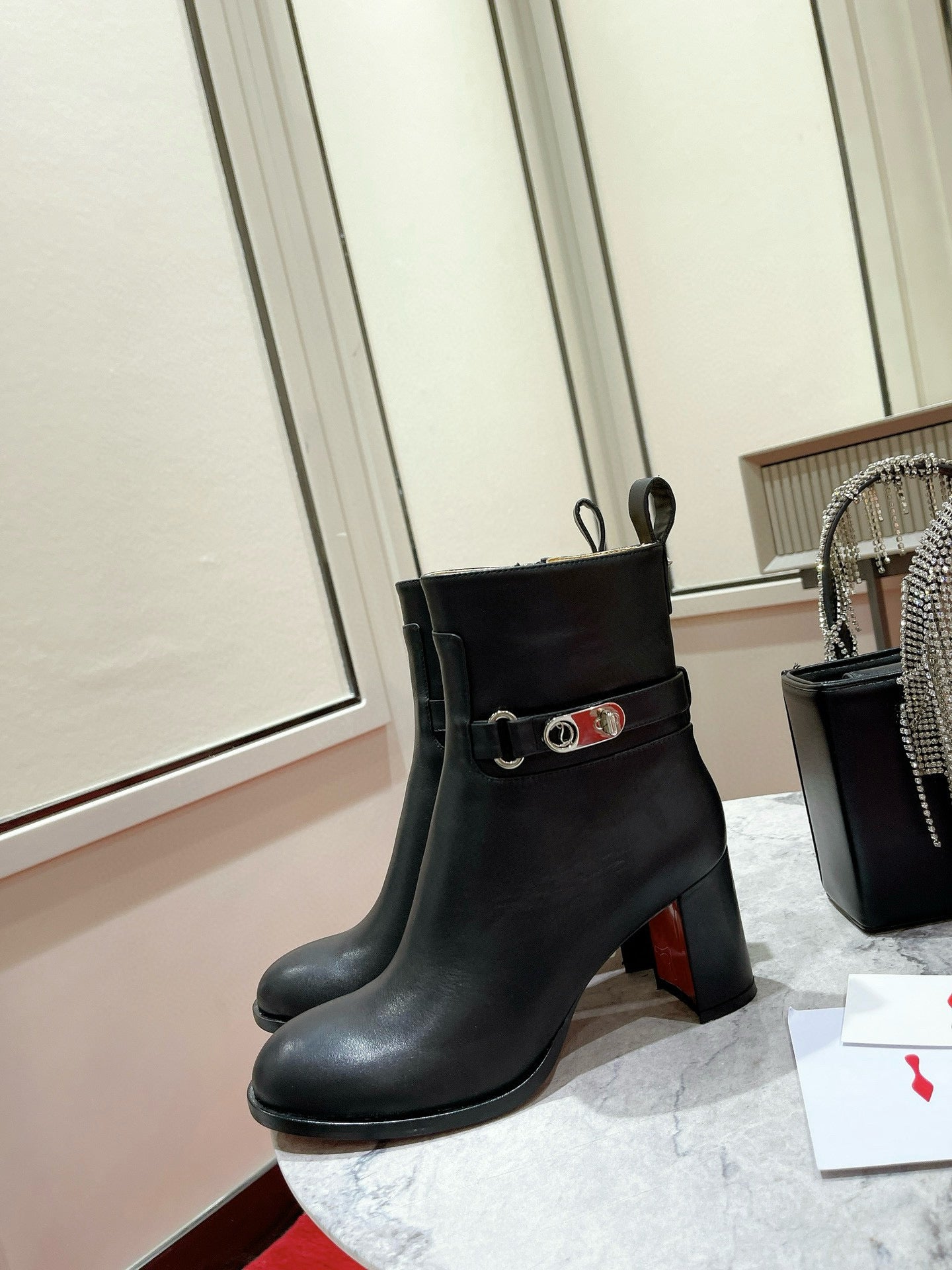 CL Turn-Lock Buckle Red Sole Booties Black Calfskin