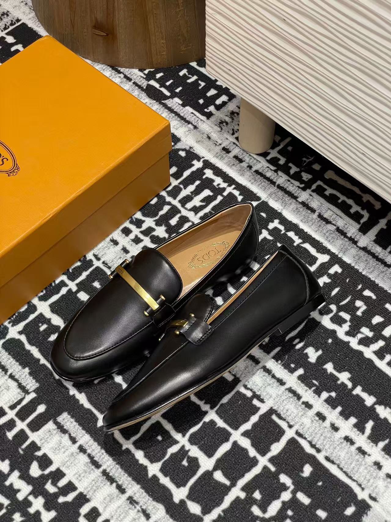 Tod's 25 Metal-bar Loafers Black Calfskin 206875