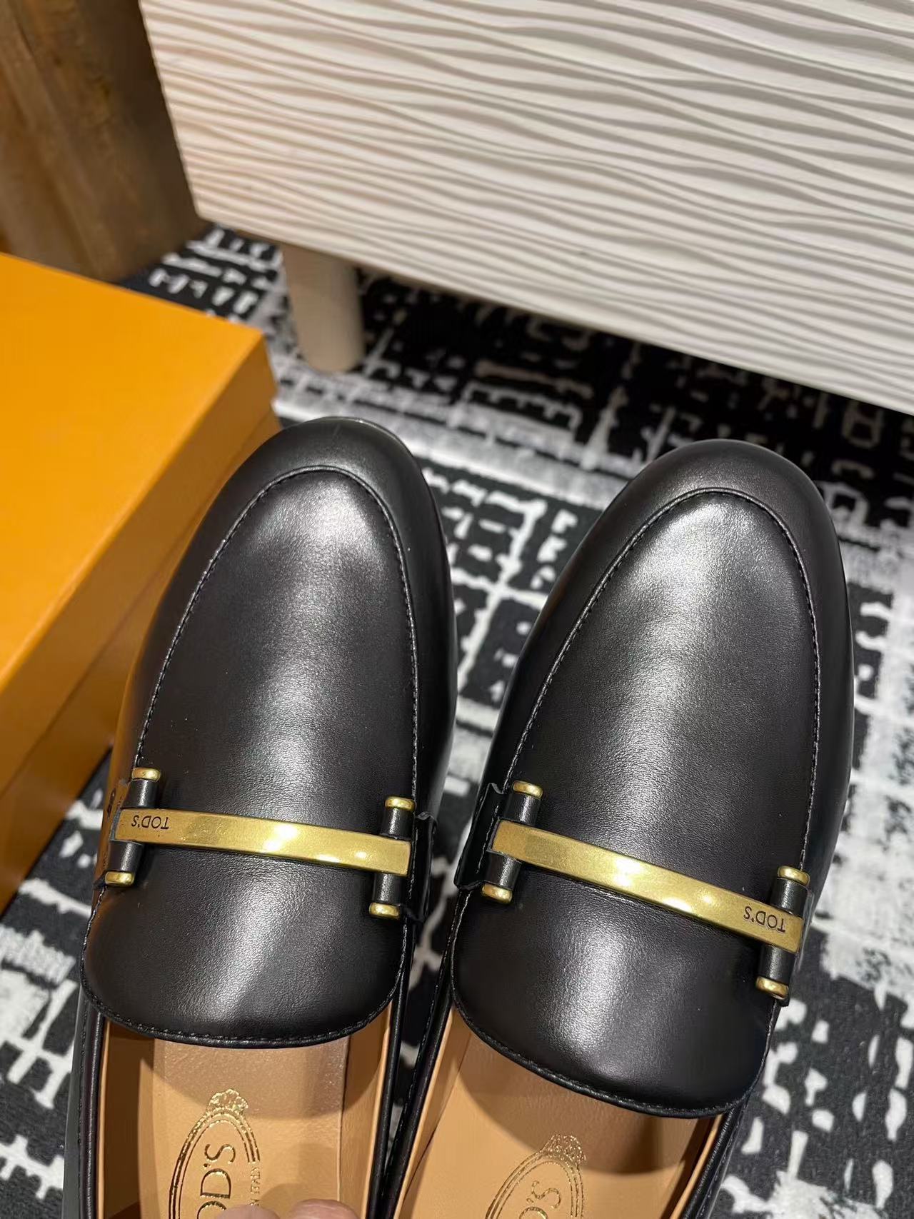 Tod's 25 Metal-bar Loafers Black Calfskin 206875