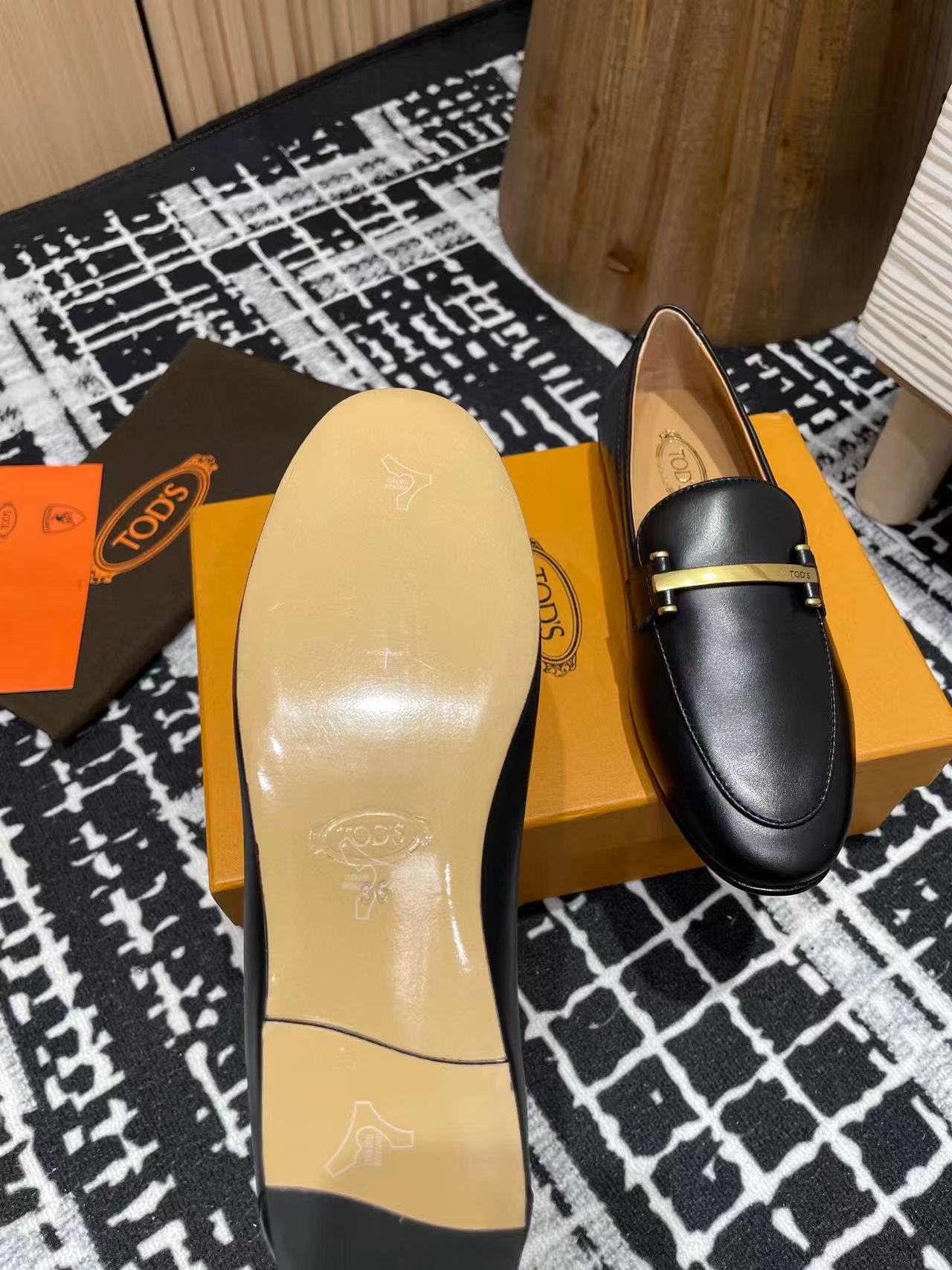 Tod's 25 Metal-bar Loafers Black Calfskin 206875
