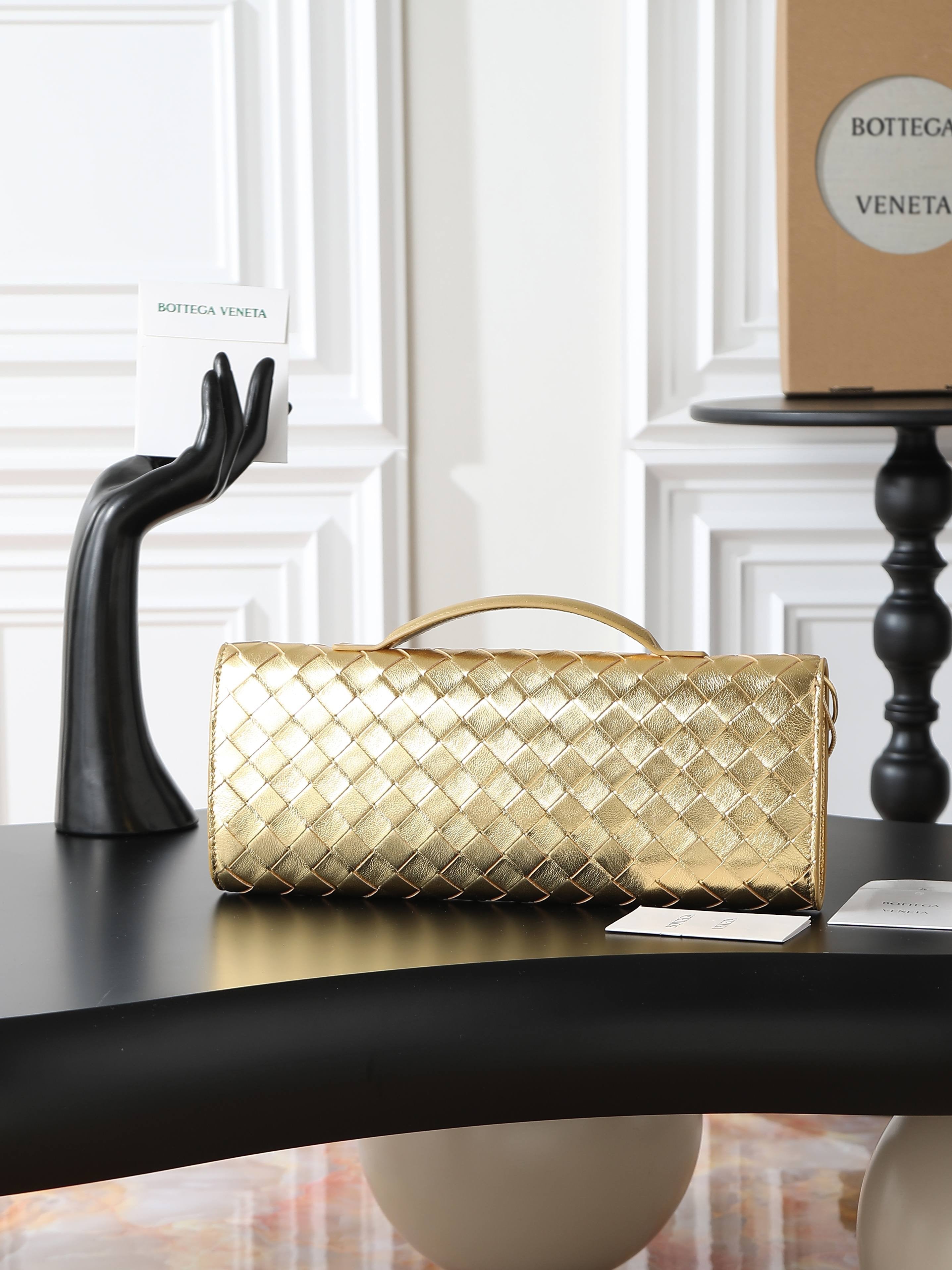 Andiamo Clutch 31cm Gold Intrecciato Leather