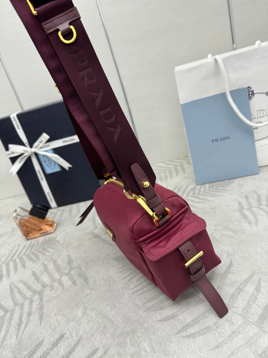 Prada 26s Small Explore Burgundy Re-Nylon 144444