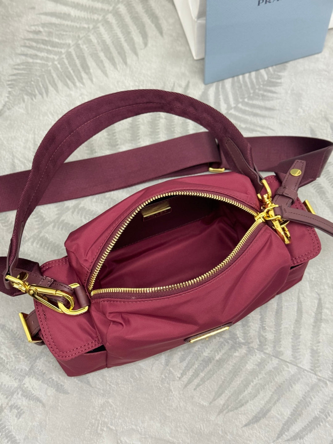Prada 26s Small Explore Burgundy Re-Nylon 144444
