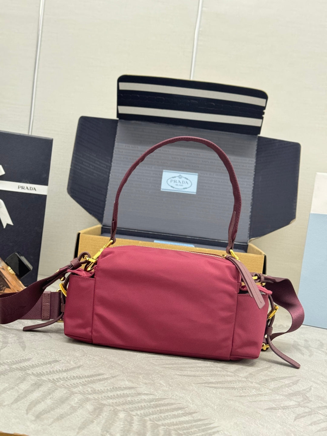 Prada 26s Small Explore Burgundy Re-Nylon 144444