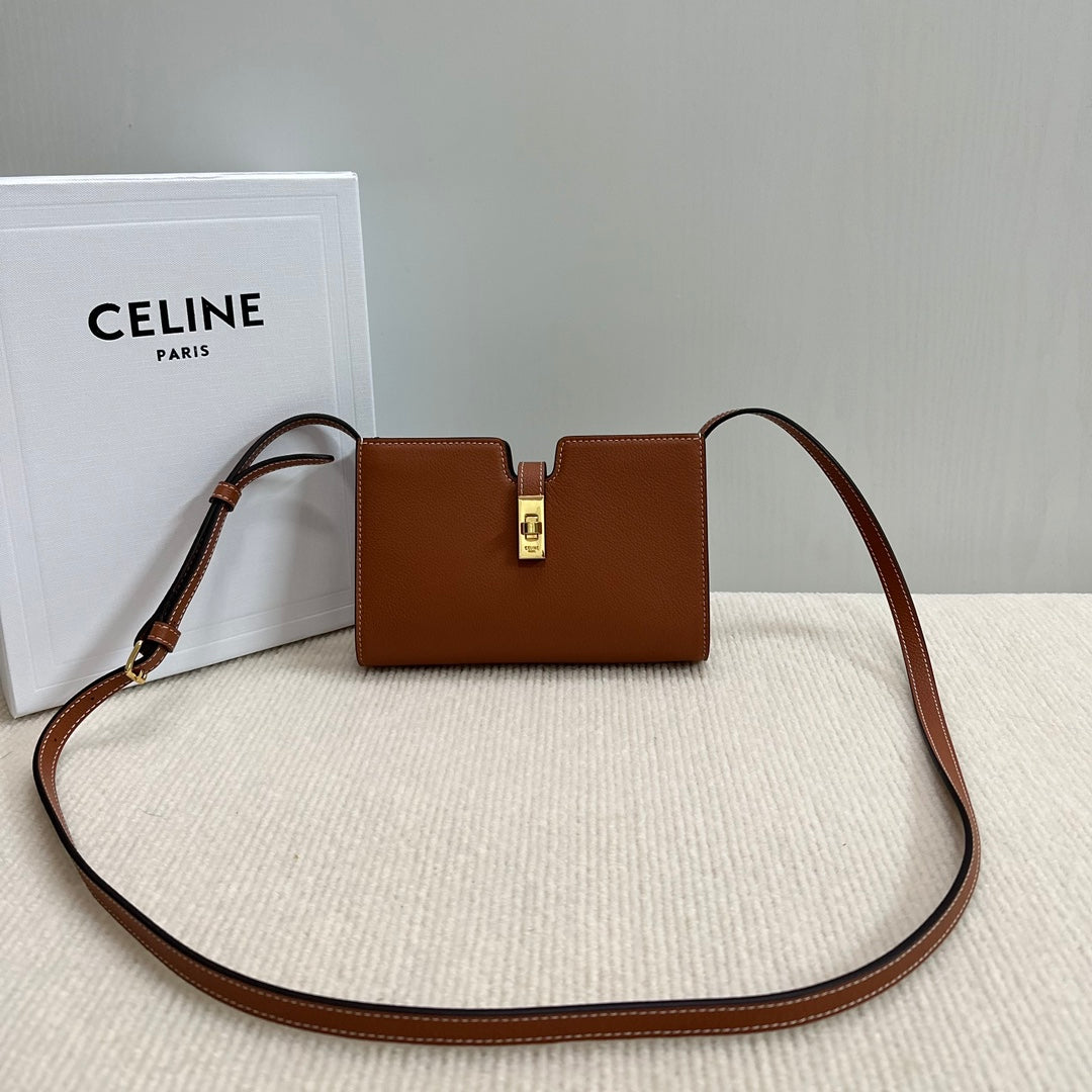 16 STRAP POCHETTE 18 IN BRONZE ORANGE SUPPLE CALFSKIN GOLD HARDWARE