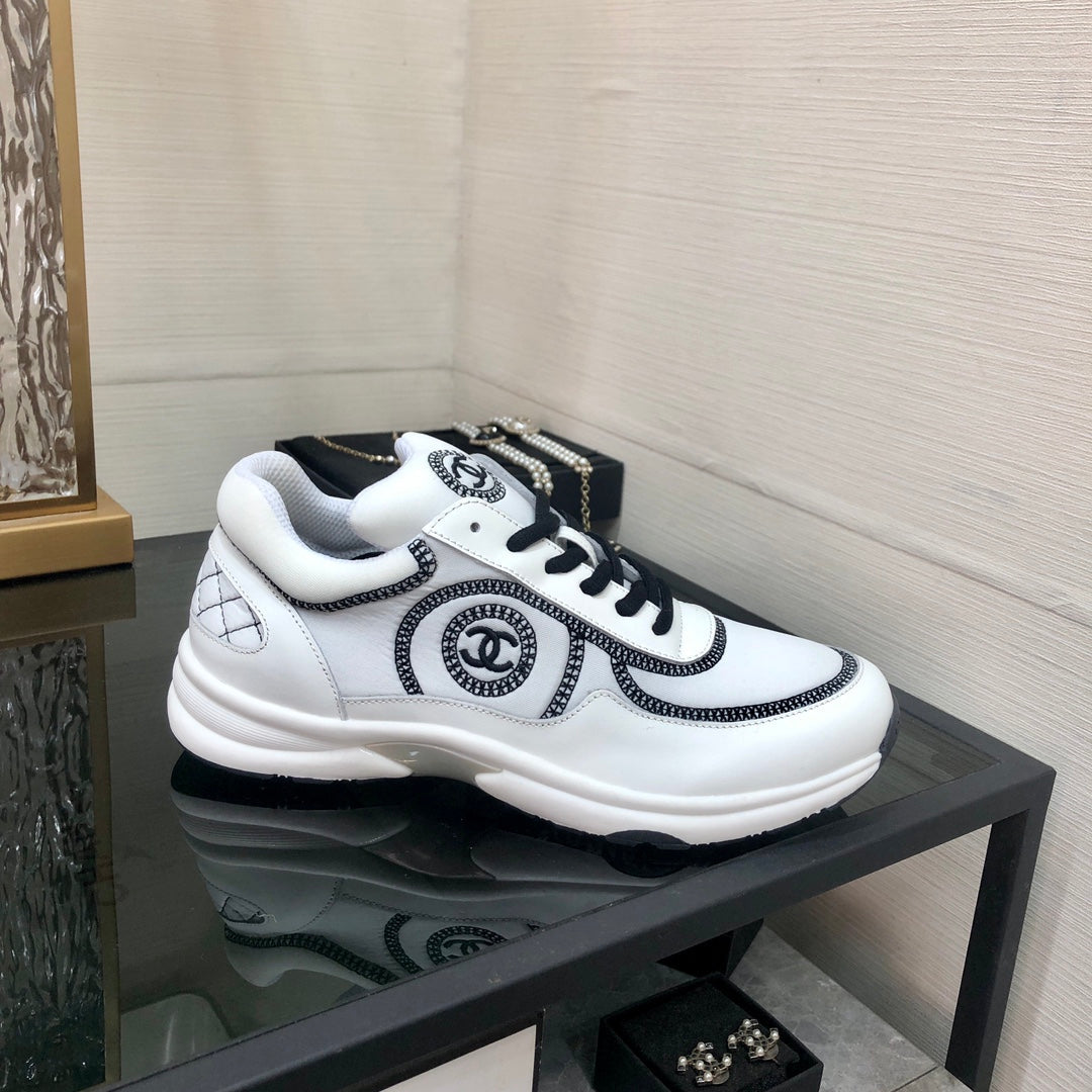 Chanel 26s Quilted Jelly Sole Sneakers White Black 153277