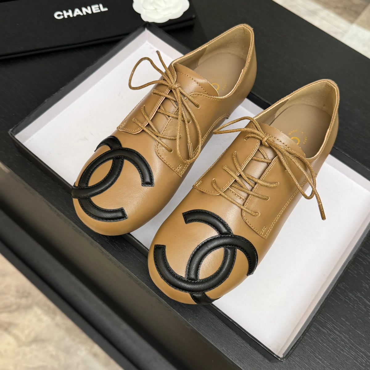 Chanel 26s Cambon Oxfords Camel Black Leather 168047