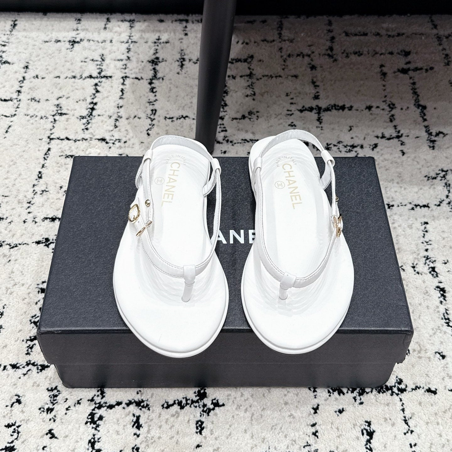 Chanel 26S Thong Sandals In White Calfskin With Gold Hardware