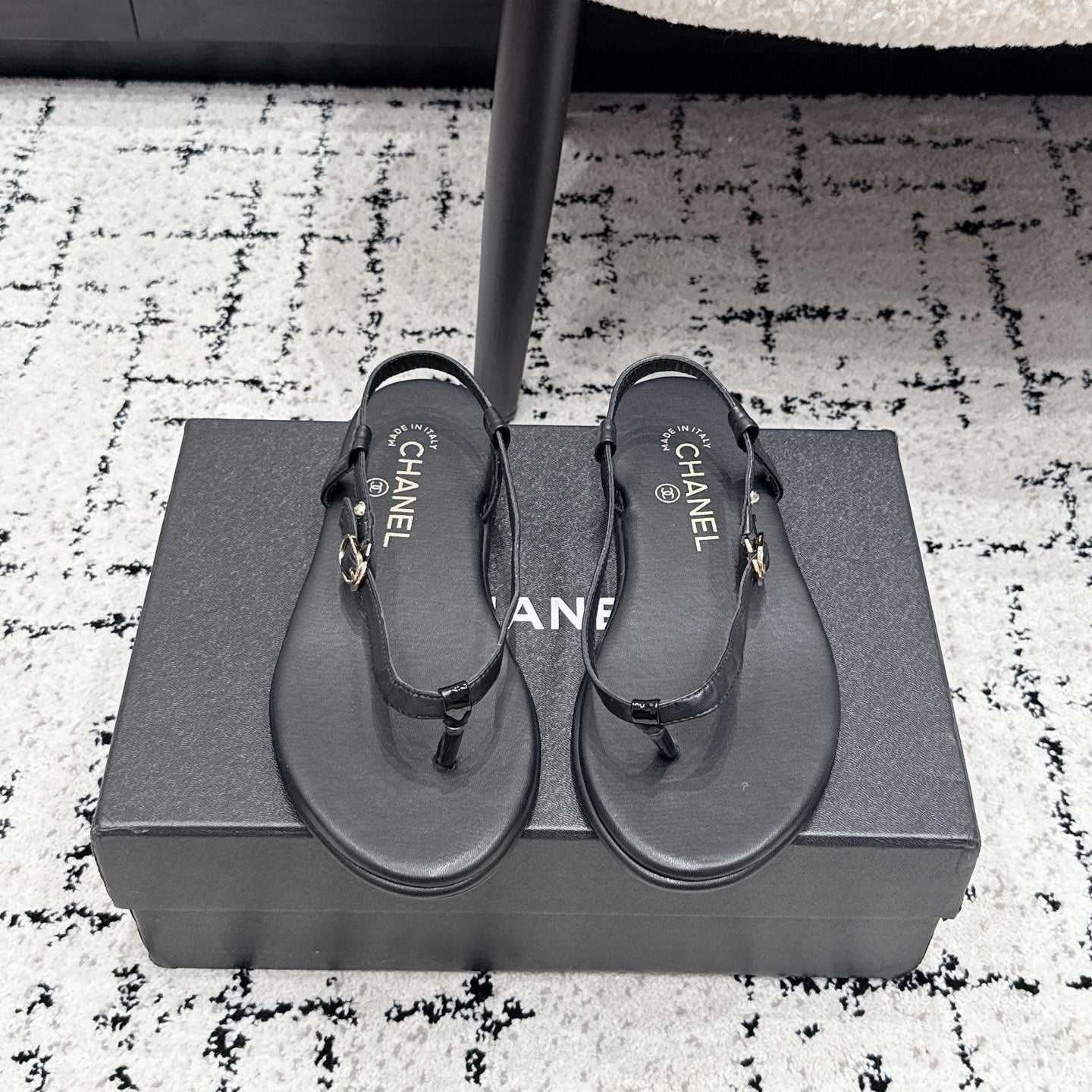 Chanel 26S Thong Sandals In Black Calfskin With Gold Hardware