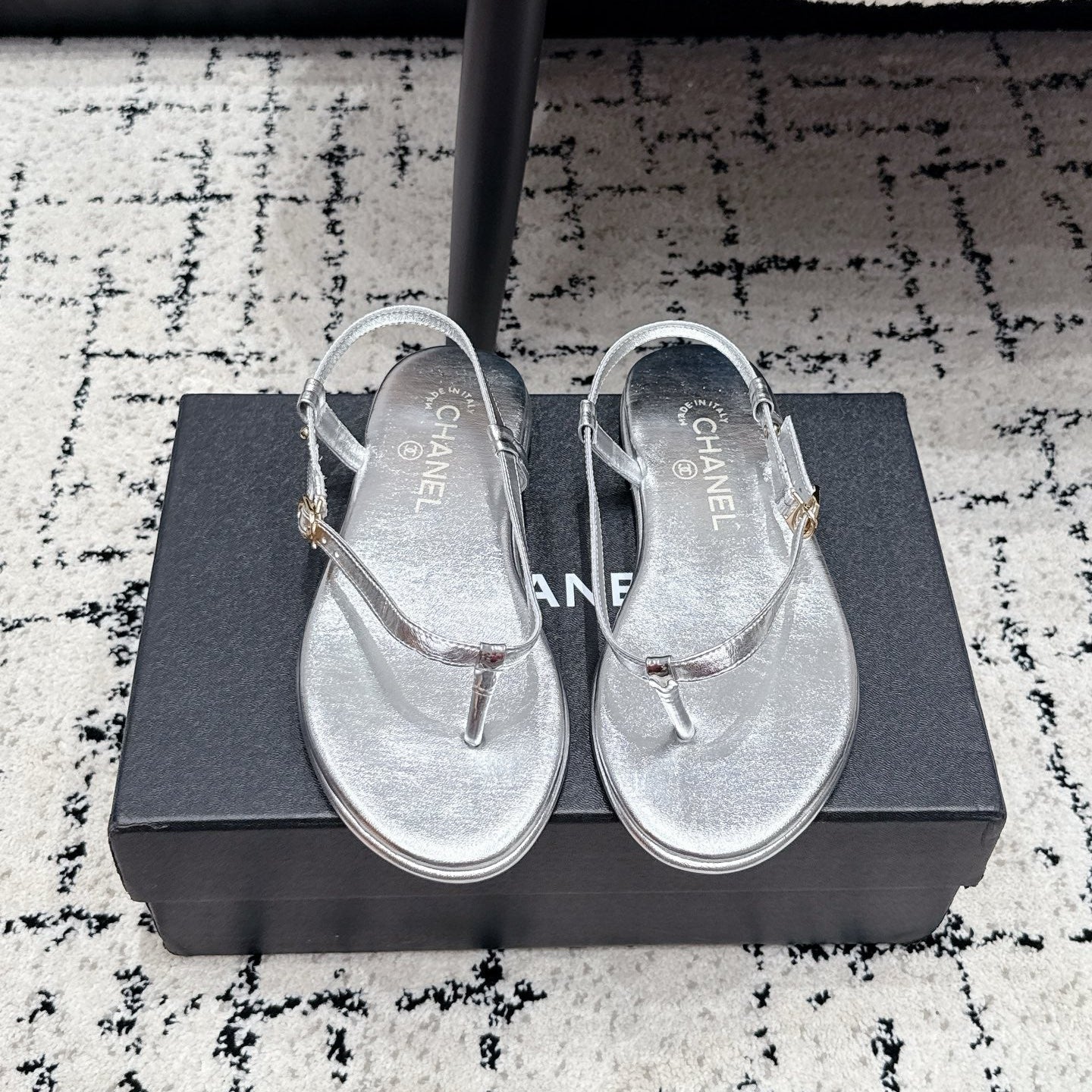 Chanel 26S Thong Sandals In Silver Calfskin With Gold Hardware