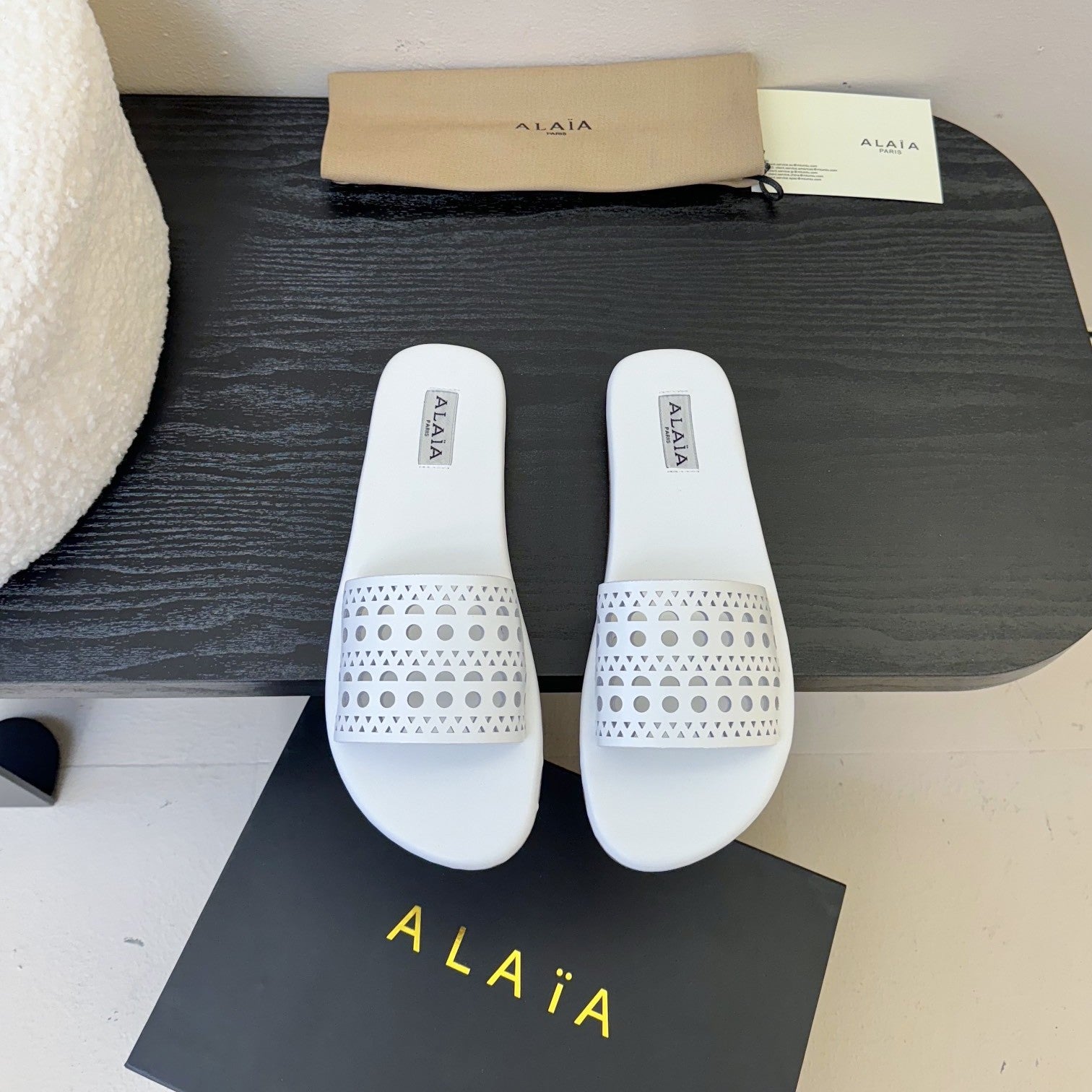 Alaia women laser-cut white leather slide 235540