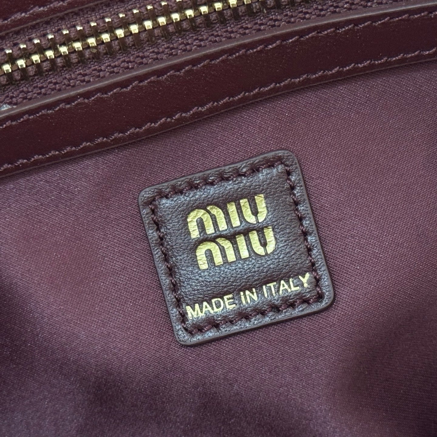 Miu Caprice Clutch Burgundy Matelassé Nappa Leather 280763