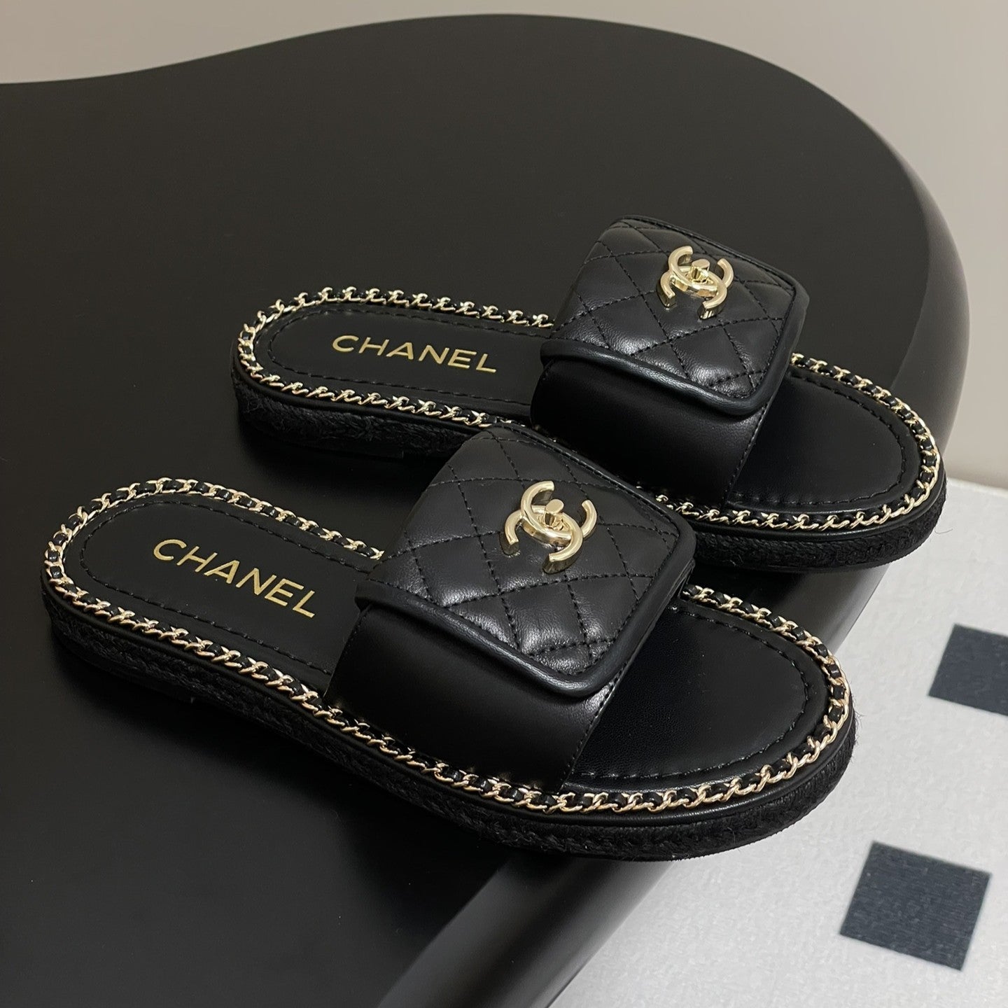 CC 25S Chain Ring Edge Buckle Bag Mule Sandal Black Sheepskin 247588