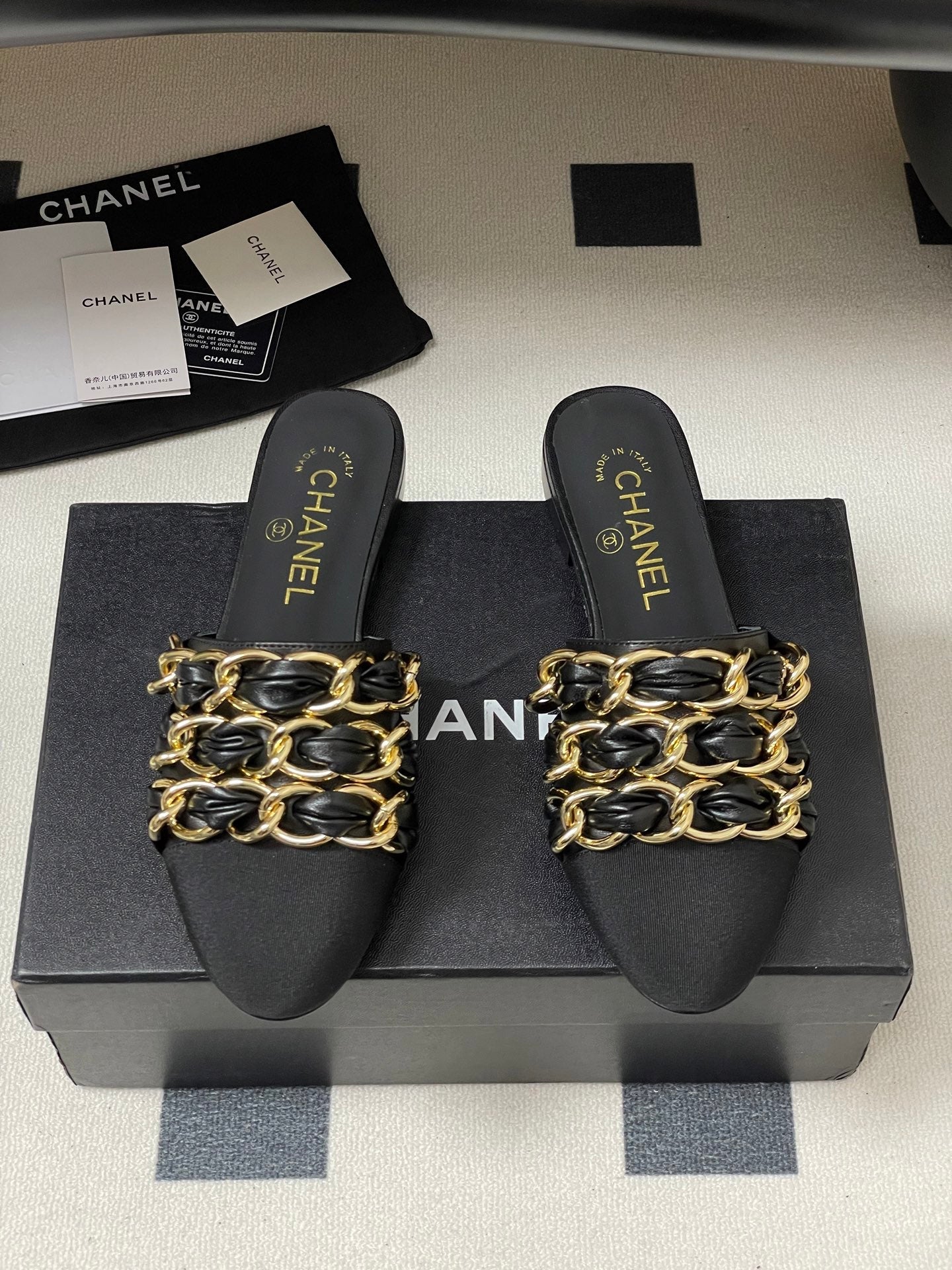 CC 25B Chain Closed Toe Flat Mule Black Sheepskin 393890