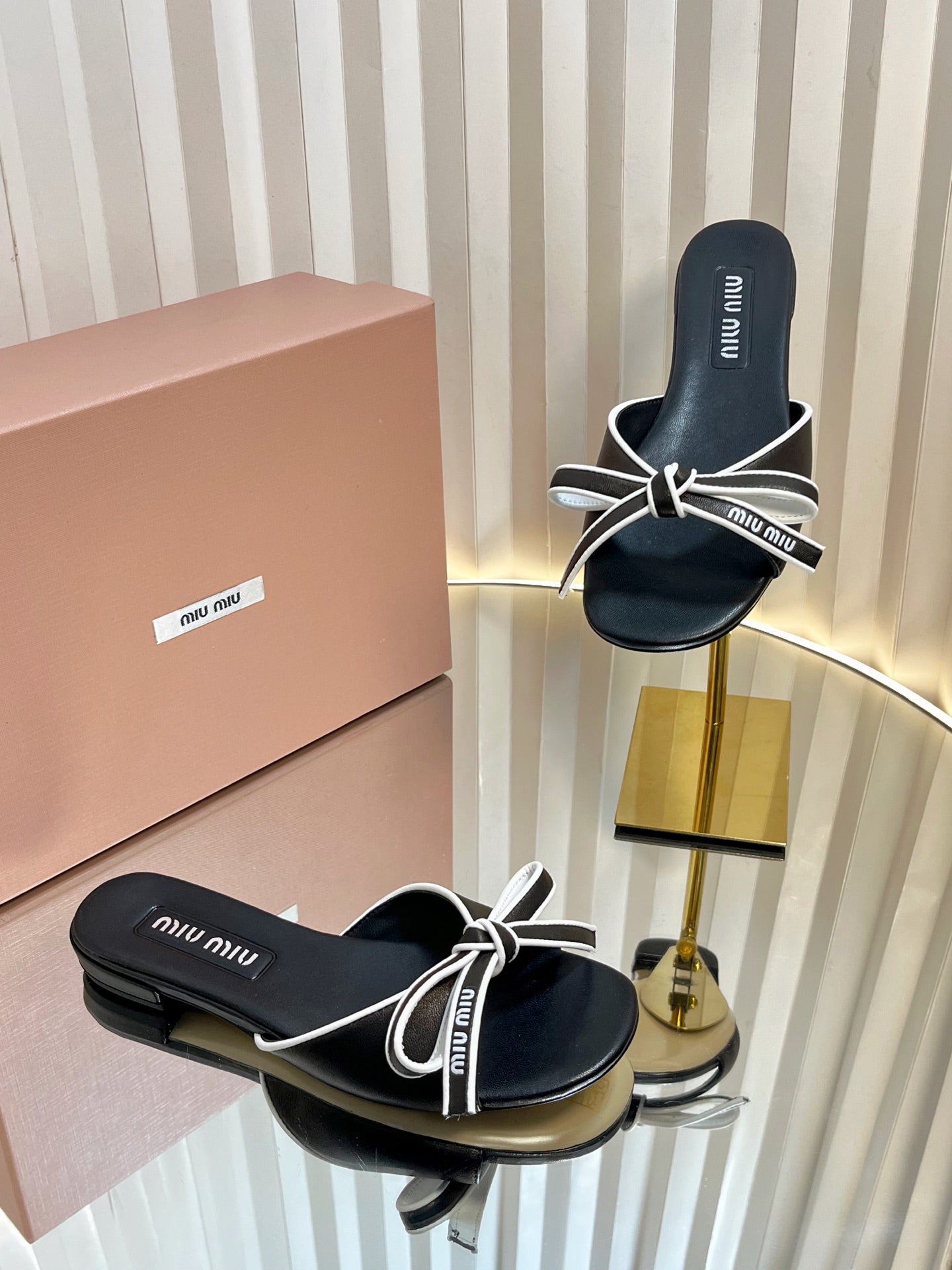 Miu Slides Sandals In Black With White Border Calfskin Bow In Trap