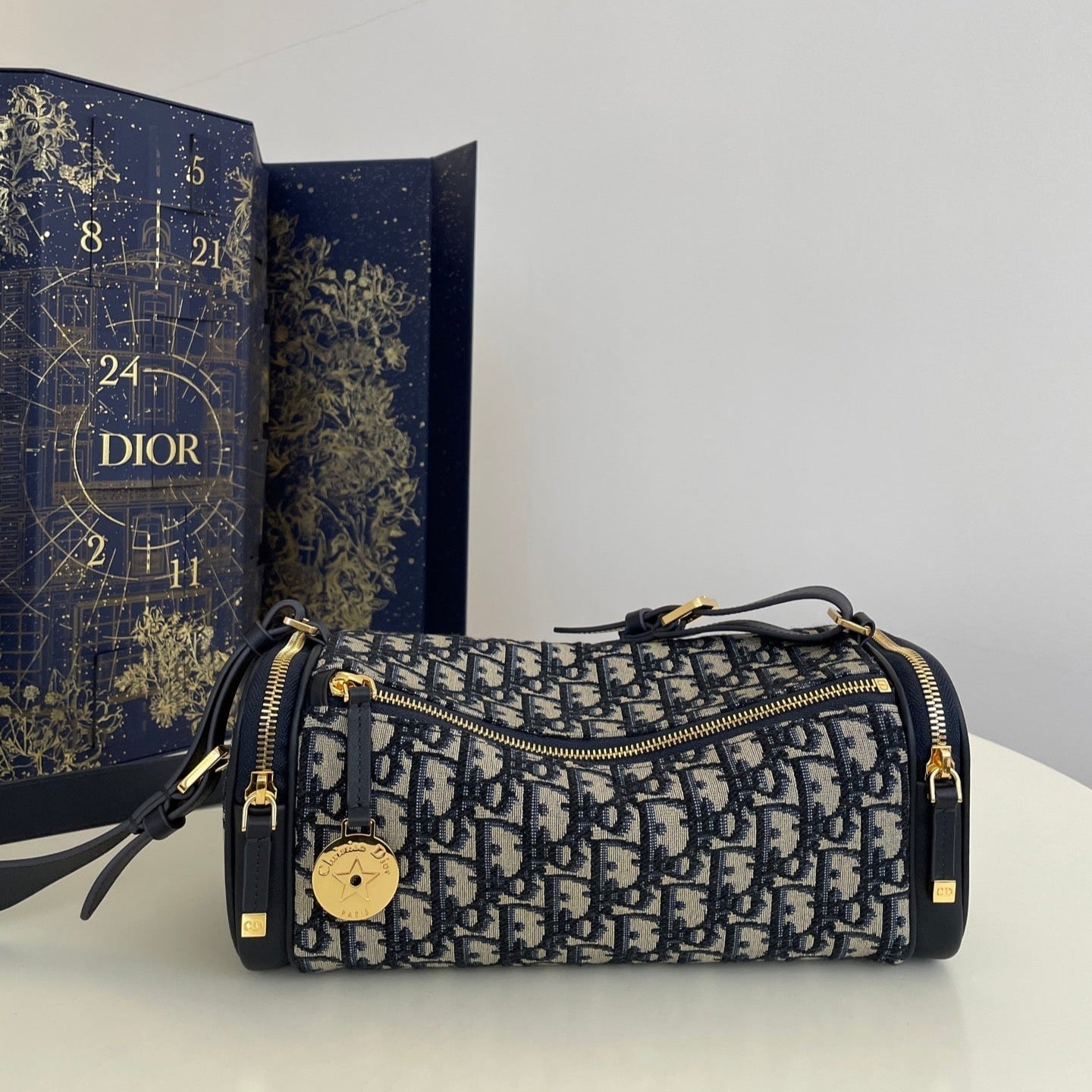 CD East-West cylindrical bag 27 blue jacquard canvas