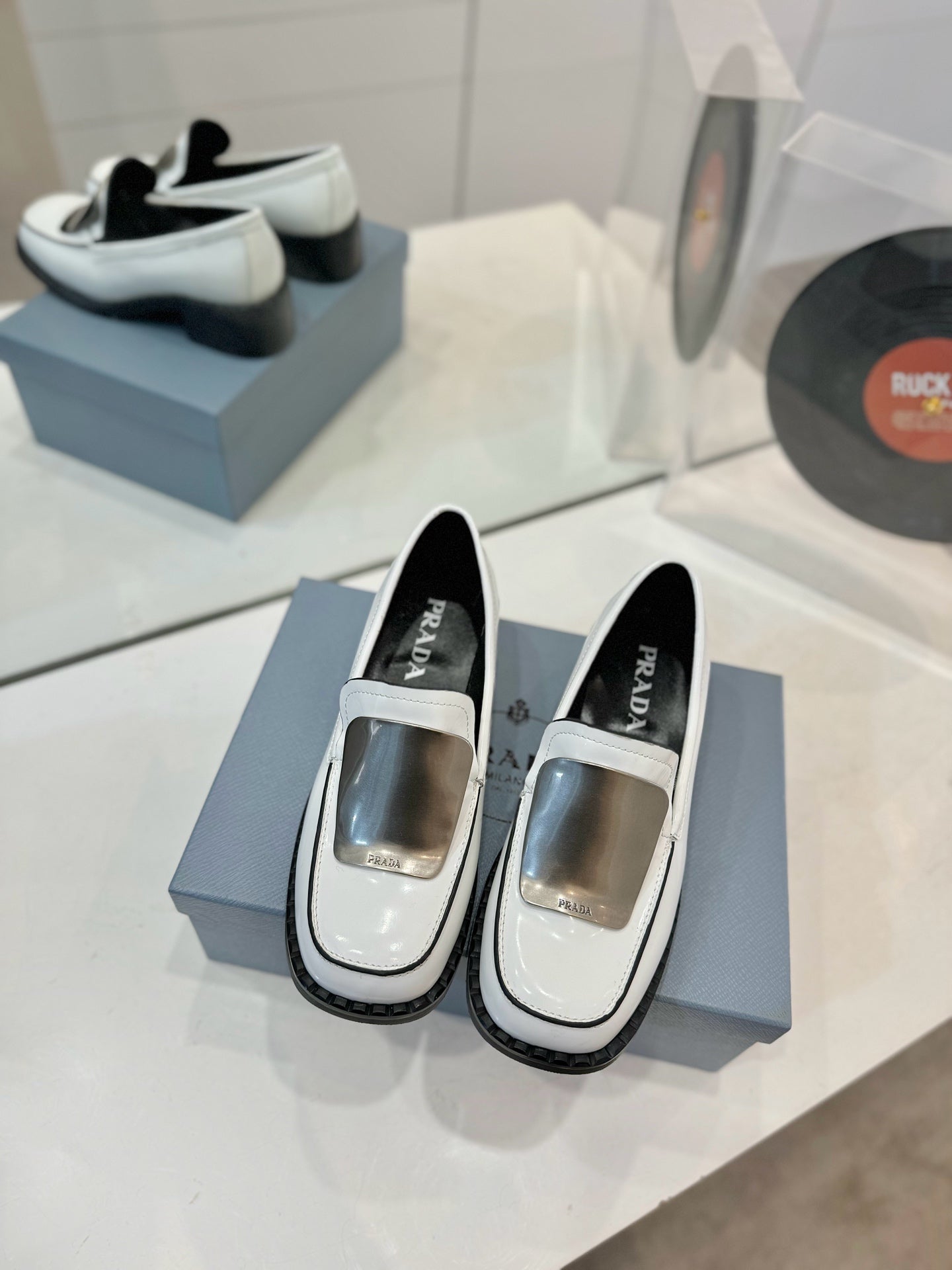 Prada 26s Metal Plate Loafers White Brushed Leather 941512