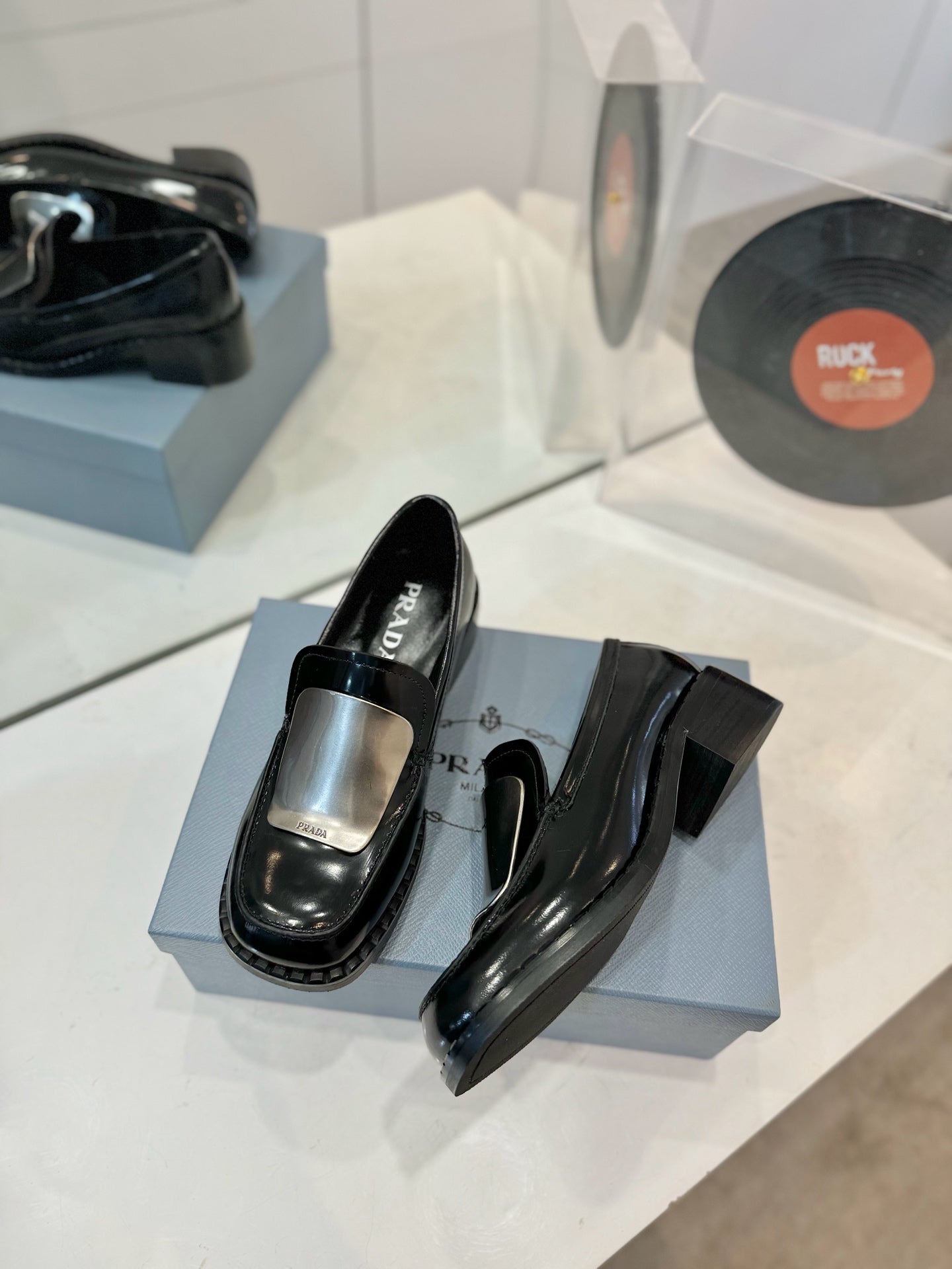 Prada 26s Metal Plate Loafers Black Brushed Leather 941513