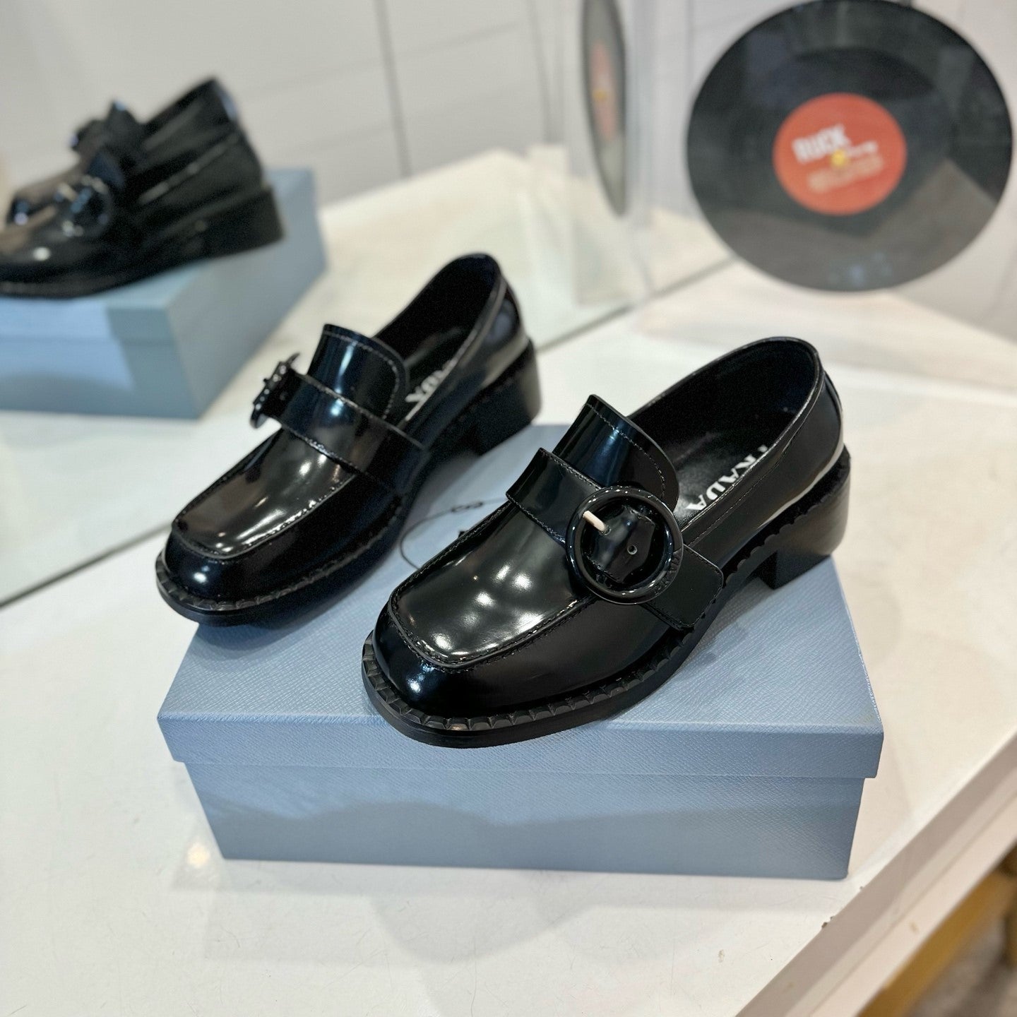 Prada 26s Heeled Loafers Black Brushed Leather 941519