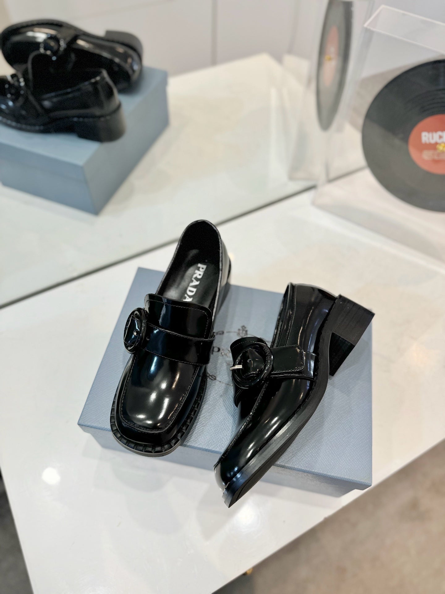 Prada 26s Heeled Loafers Black Brushed Leather 941519