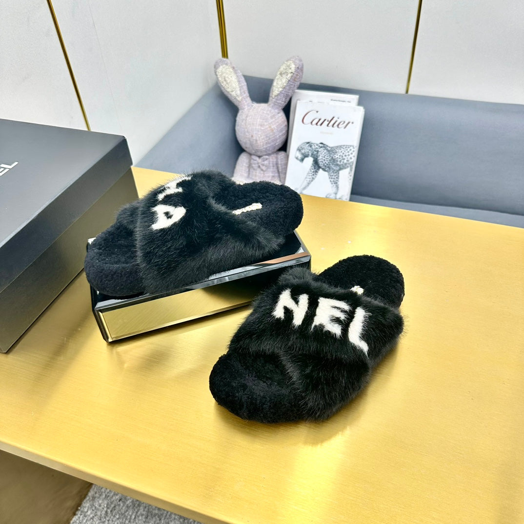 CC 26s Crisscross Sandals Black White Shearling 139990