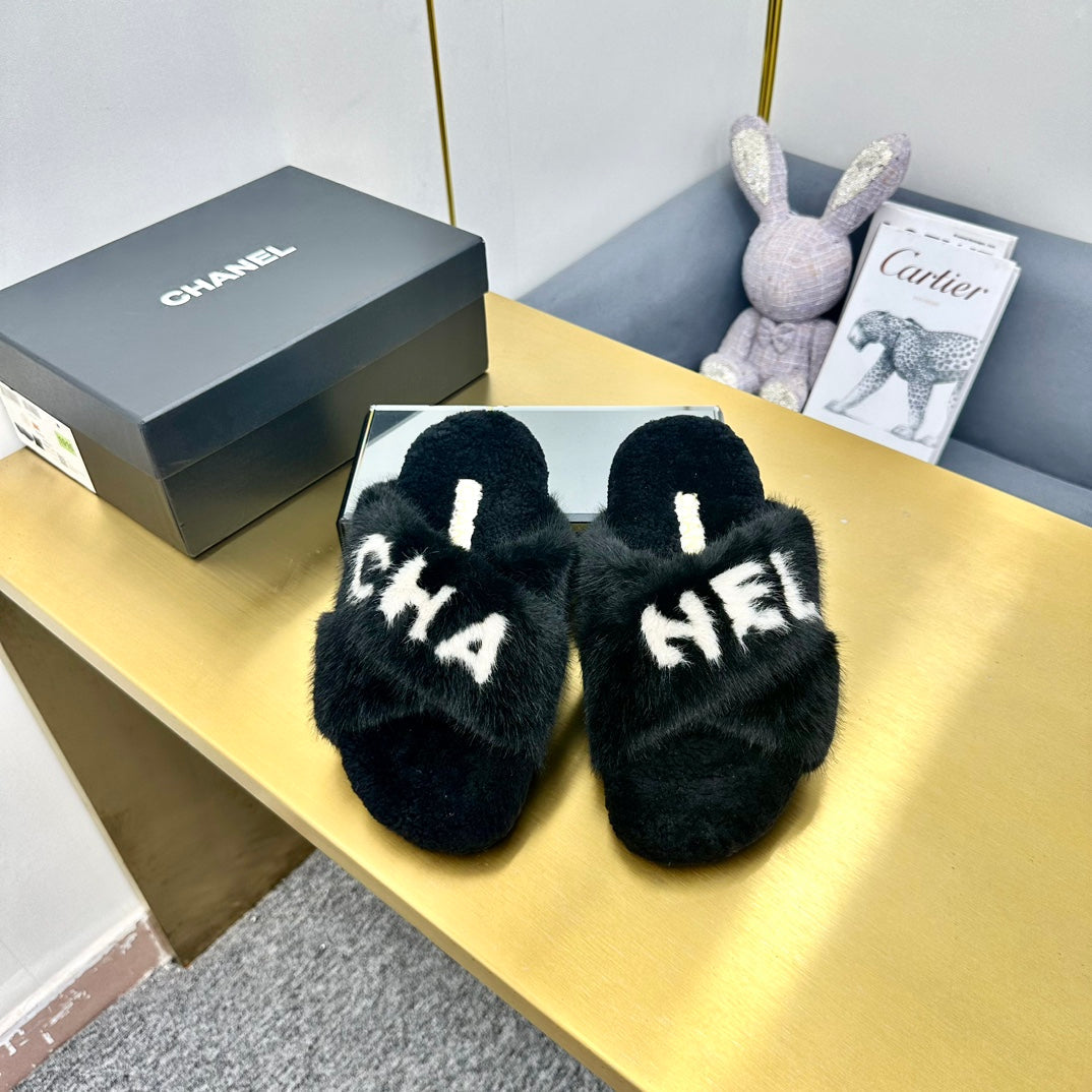 CC 26s Crisscross Sandals Black White Shearling 139990
