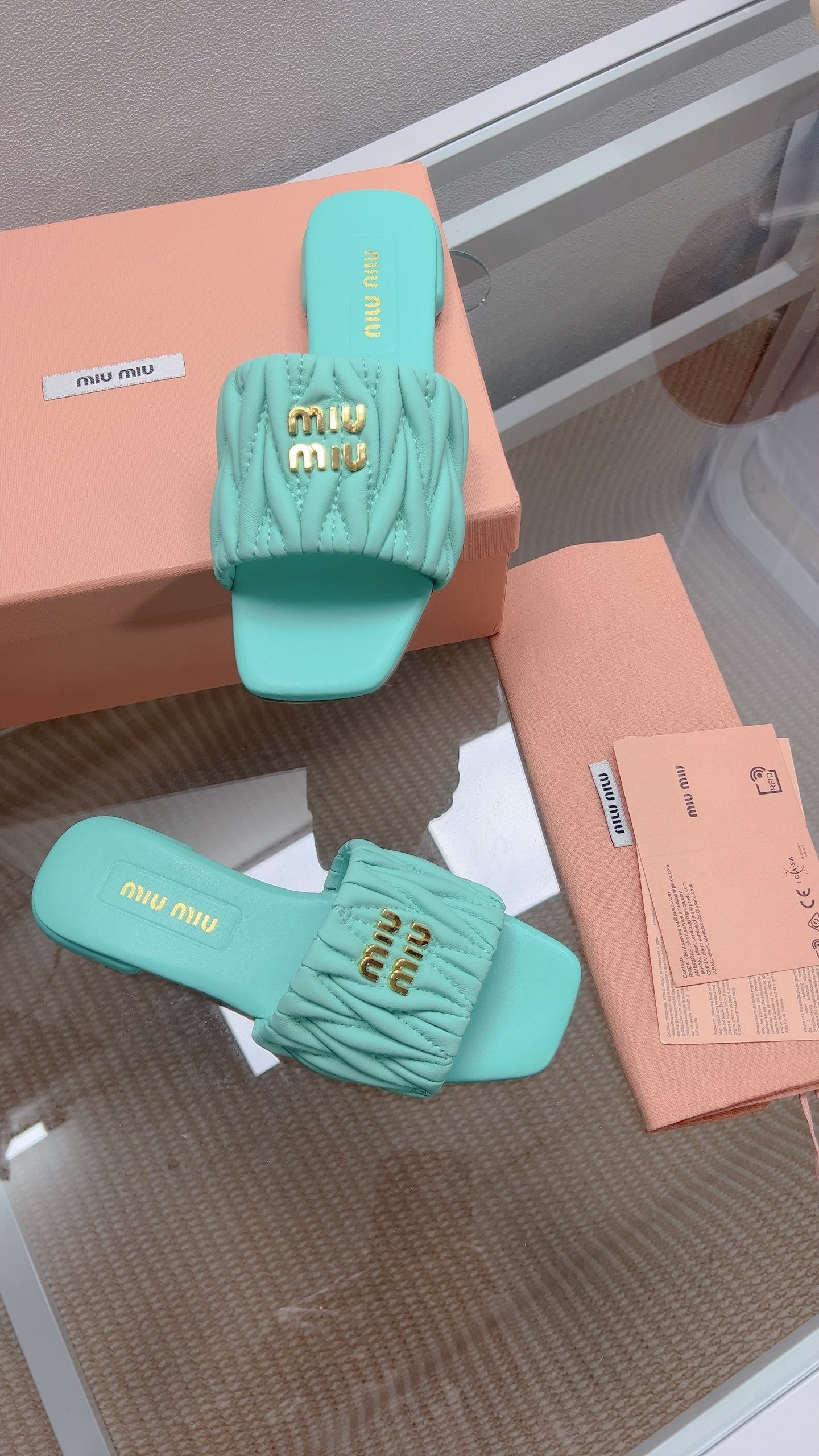 Miu Matelassé Slides Light Blue Leather 739553
