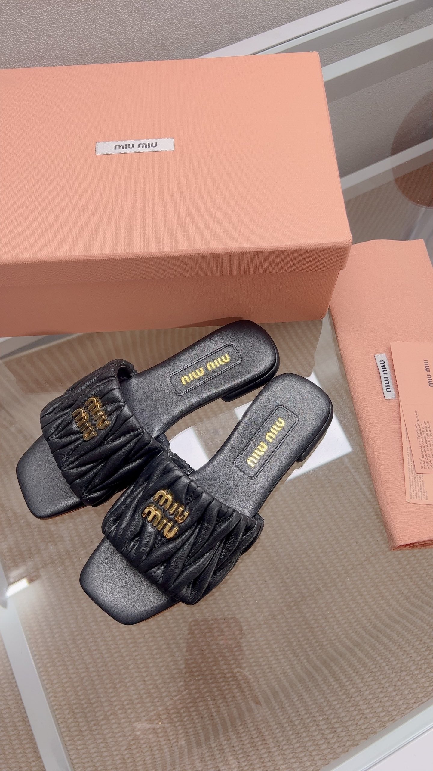 Miu Matelassé Slides Black Leather 739554
