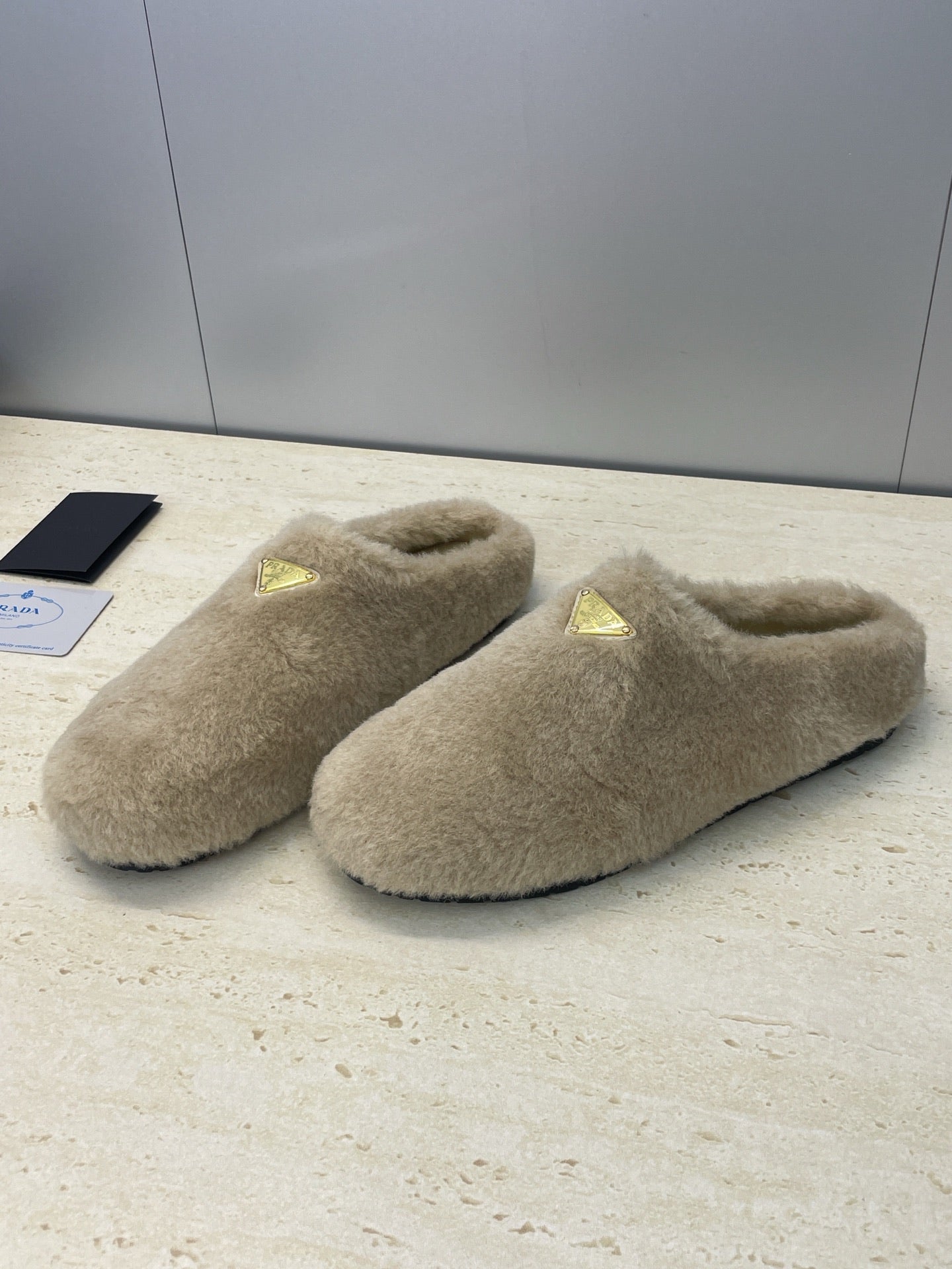 Prada 25s Slide Warm Beige Shearing 551888