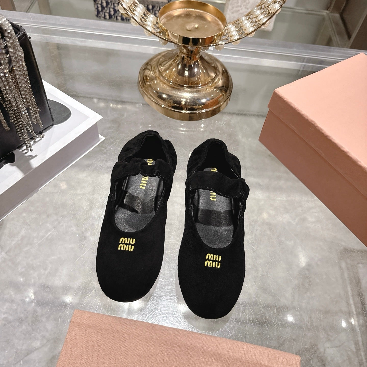 Miu 26s Mary Jane Flats In Black Suede Elastic Strap