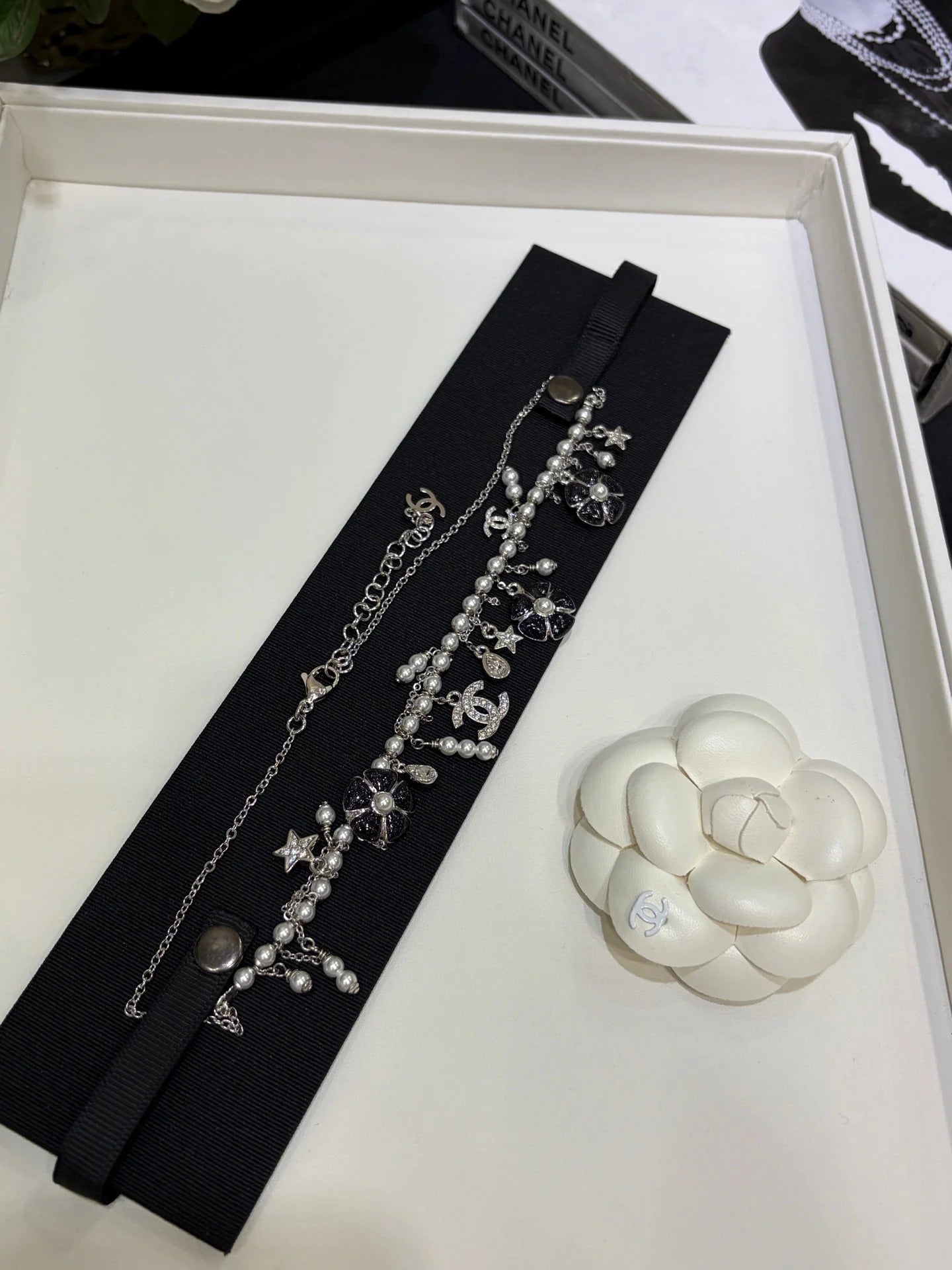 Chanel 2026 Silver Double C Black Flower Pearl Tassel Necklace