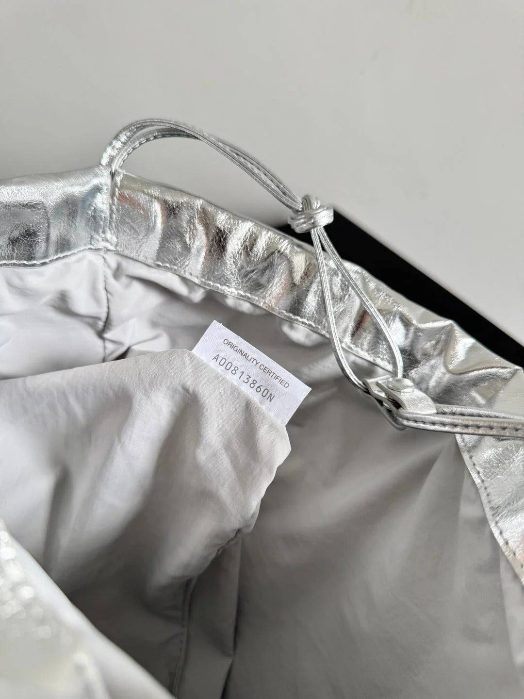 Bottega Veneta 2026 Dust Bag Silver Laminated Leather