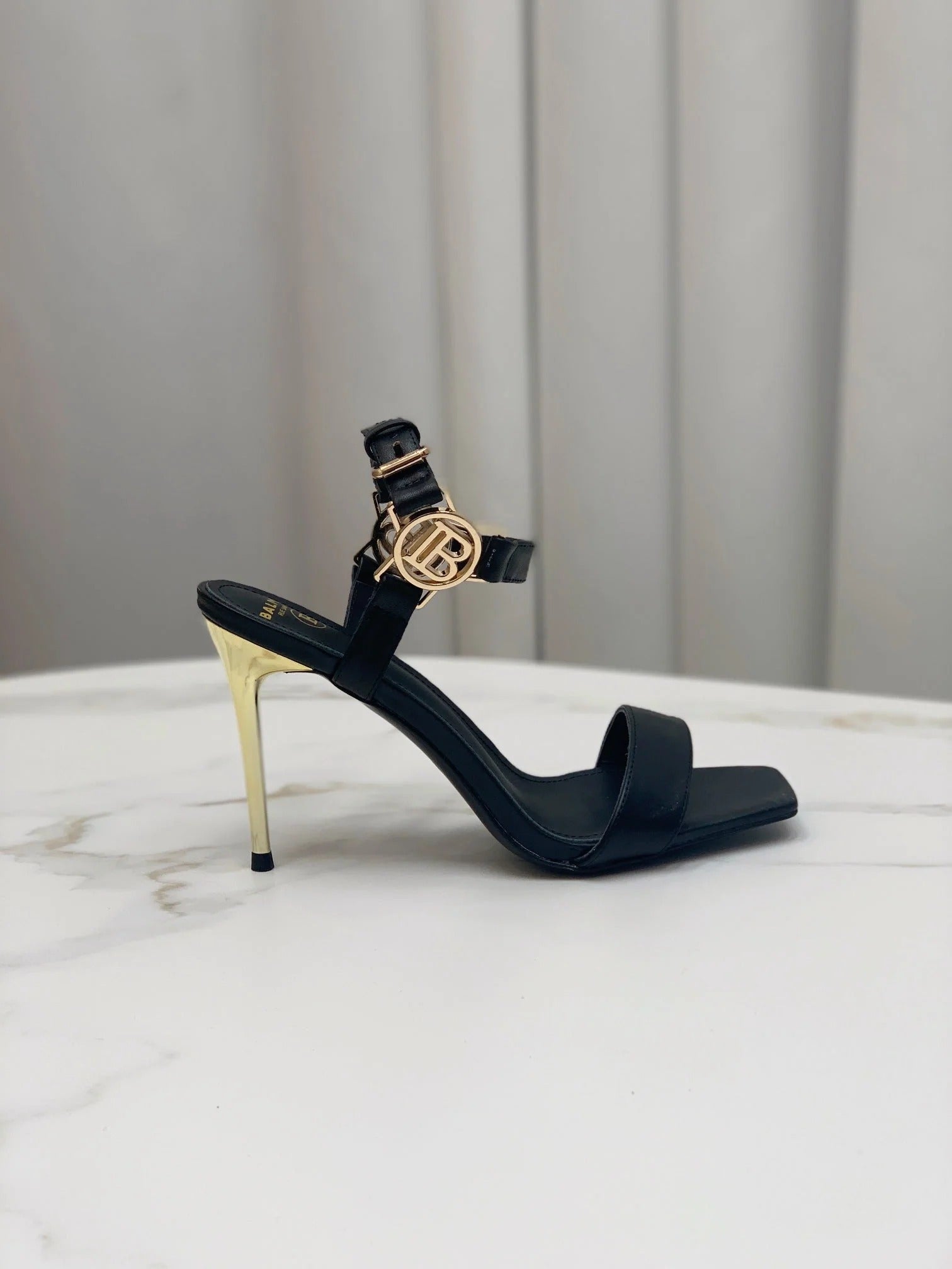 BALMAIN 25S HIGH HEELS WITH B METAL DETAIL 95MM IN BLACK CALFSKIN