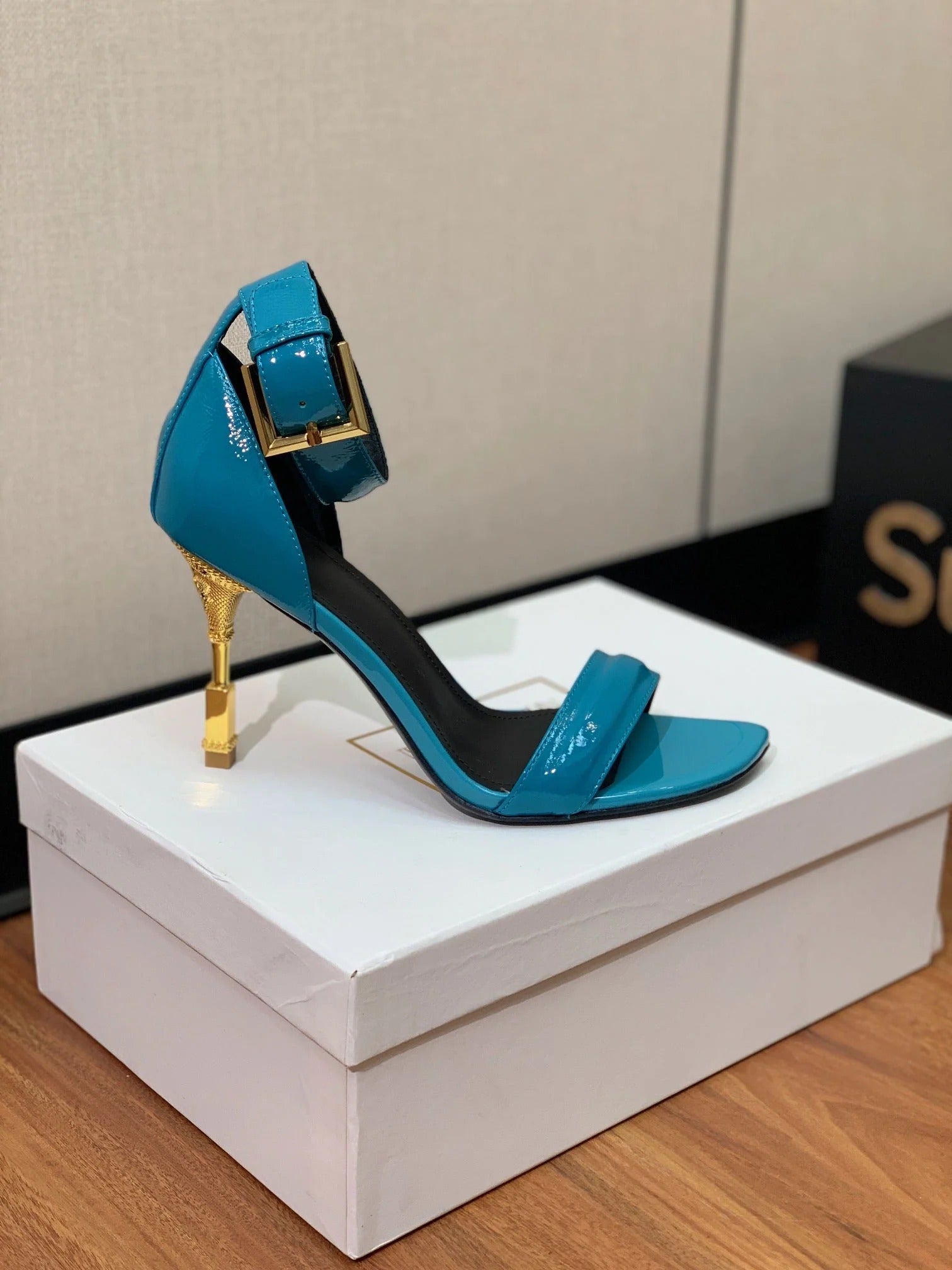 BALMAIN 25S SQUARE STRAP HIGH HEELS 100MM IN BLUE PATENT CALFSKIN