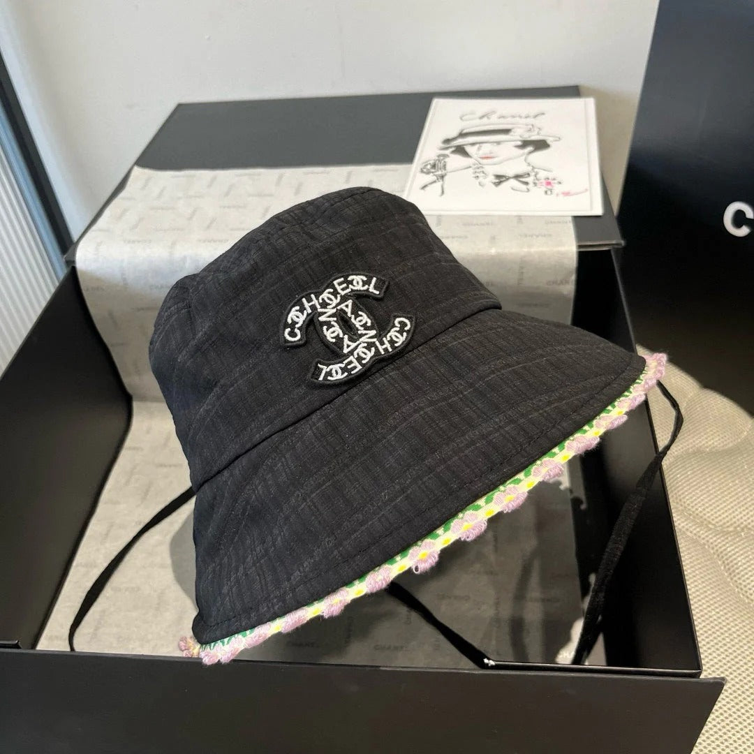 BLACK BUCKET HAT WITH FLORAL BORDER 673996